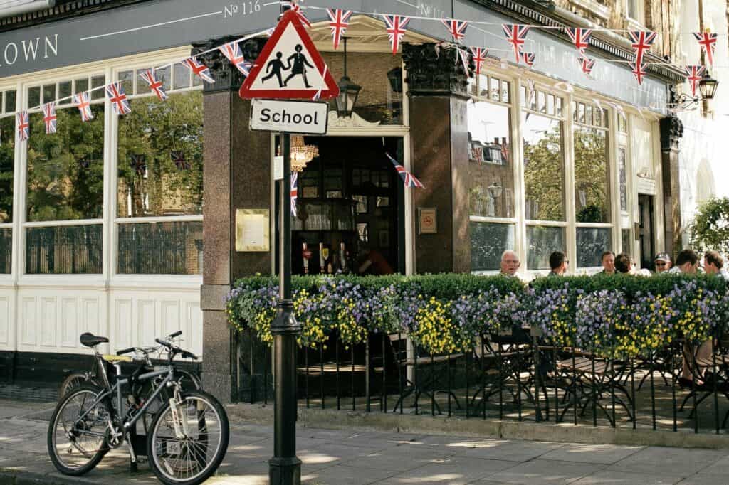 A street crossing with a school zone sign